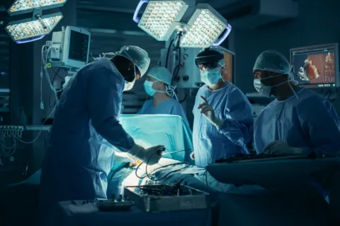 Surgeon navigating surgery with the help of AI. 