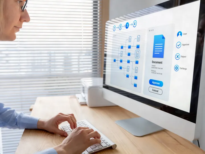 Woman working with file manager on computer screen at the office 
