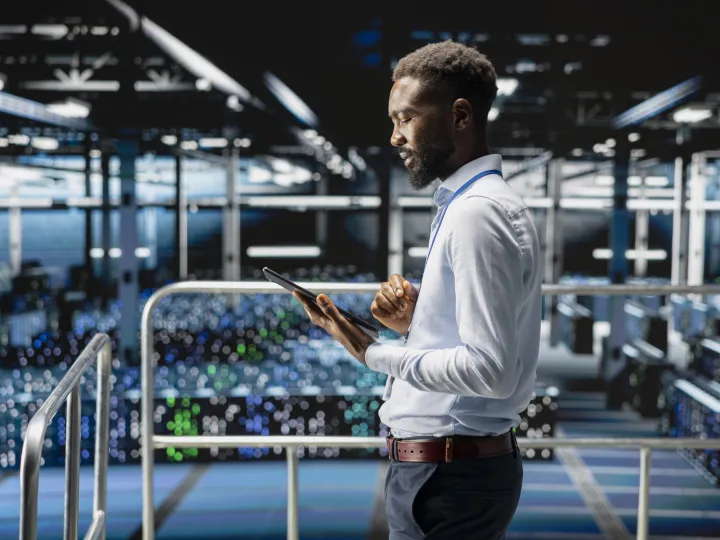 data center employee on platform works on neural network software tasks