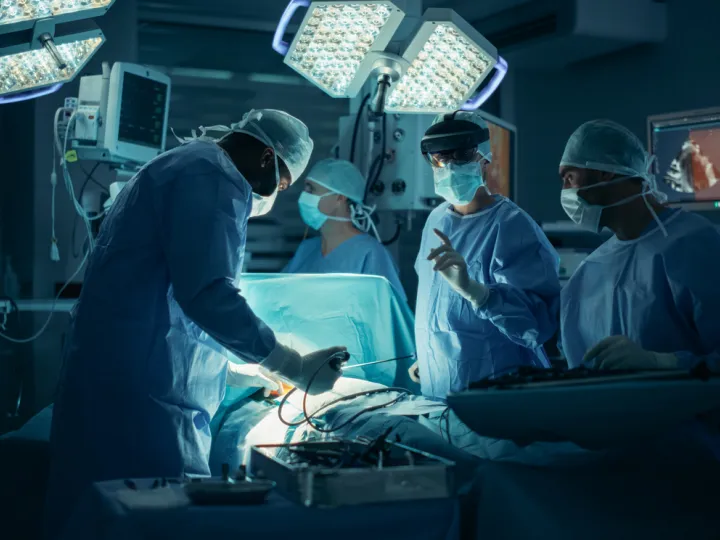 Surgeon navigating surgery with the help of AI. 